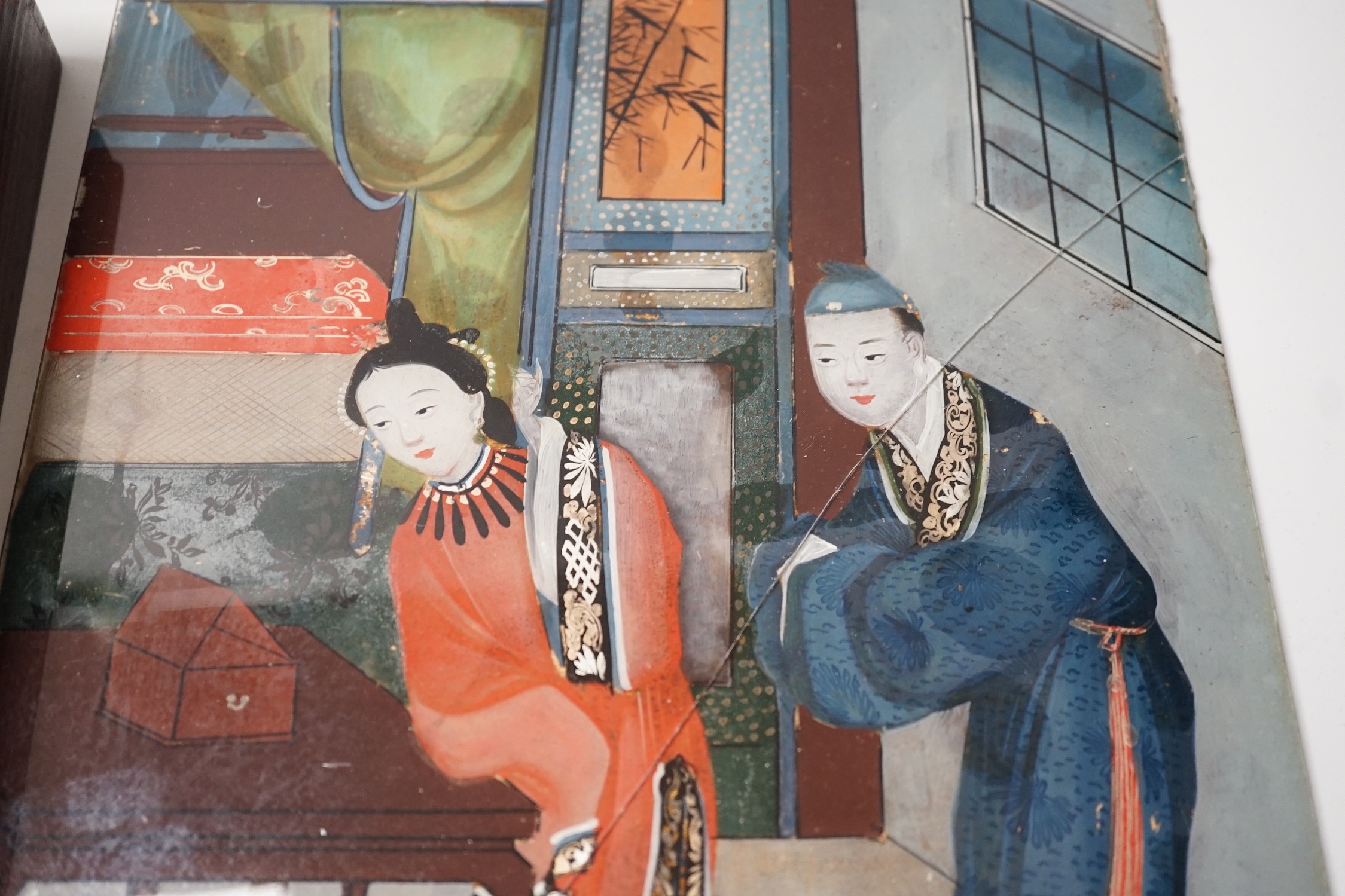 A Chinese reverse glass painting and a box cover with reverse painted glass panel